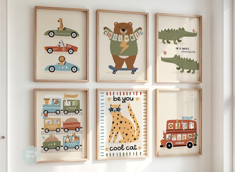 May include: Set of 6 colourful framed prints featuring illustrations of animals and vehicles. The prints include a lion driving a blue car, a bear on a skateboard, a crocodile, a train with animals, a cat wearing sunglasses, and a double-decker bus with animals.