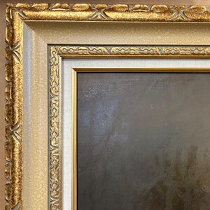 May include: A framed oil painting of a still life featuring a bouquet of flowers in shades of purple, white, and yellow. The flowers are arranged in a vase and are set against a dark background.