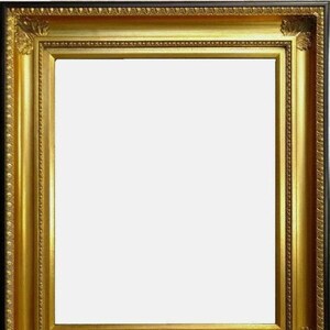 May include: A gold picture frame with a black inner edge and ornate detailing. The frame is empty.