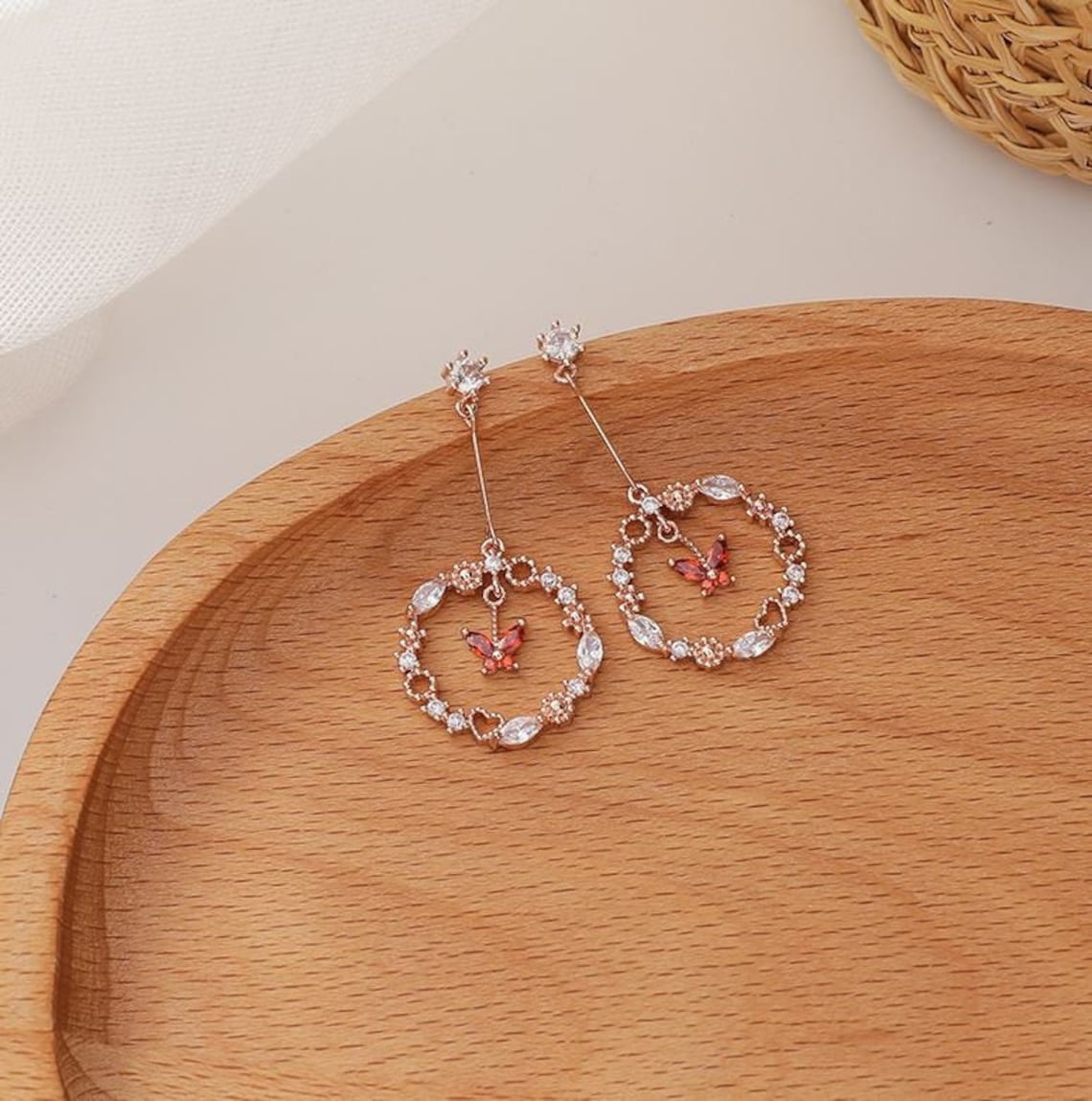 Orecchini realizzati con ottone e radice di rubino. Peso 13gr Lunghezza