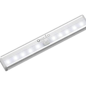 May include: A silver motion-activated LED light strip with the brand name "OxyLED" printed on it. The light strip has eight white LED lights and a motion sensor.