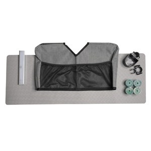 May include: A gray yoga mat with a gray and black storage bag, a silver metal hook, and four green foam rollers.