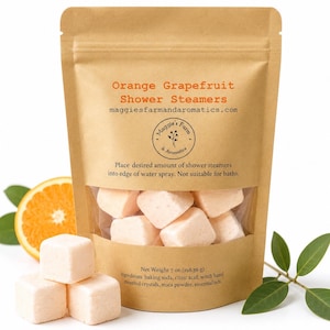 orange grapefruit shower steamers. Orange cubes in a kraft ziplock bag.