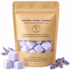 lavender shower steamers. purple cubes in a kraft ziplock bag.