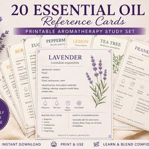 May include: A set of 20 essential oil reference cards with a lavender sprig illustration. The cards are beige with purple text and accents, and include information on aromatherapy, common uses, and safety considerations. The text reads "20 Essential Oil Reference Cards".