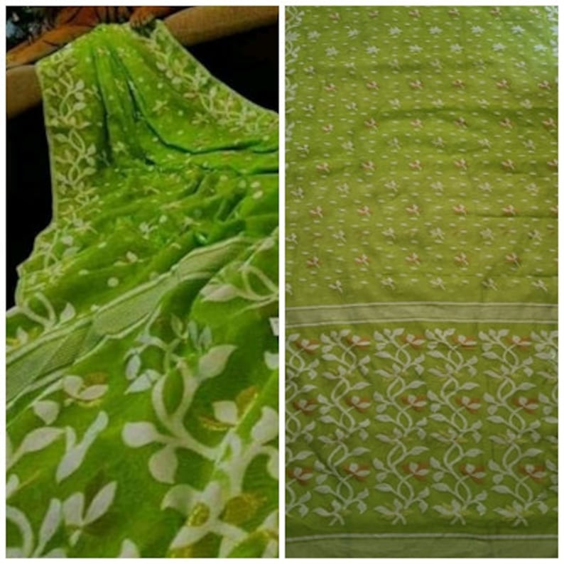 May include: A green and white patterned saree with a floral design. The saree is made of a lightweight fabric and has a delicate, flowing drape.