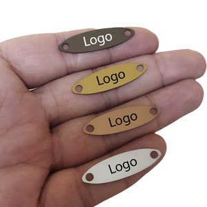 Clothing Metal Tag , Customized Oval Clothes Tag  , 10x35 mm, Customized Tag , Brand Logo Tag