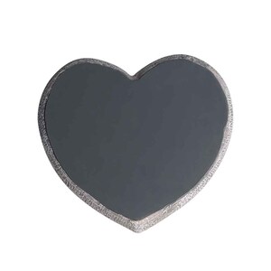 May include: A heart-shaped chalkboard with a distressed grey finish. The chalkboard is blank and ready to be written on.