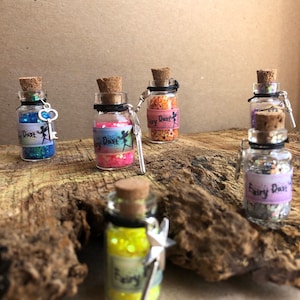 Älvdamm i flaska med berlock, älvdamm, tandfédamm, älvmagi, strössel, gnistrar, älvdörrsaccessoar, festgåva