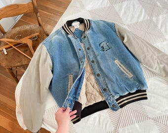 Rare Vintage Universal Studios Varsity Jeans Bomber Jacket Rare Vintage Universal Studios Varsity Jeans Bomber Jacket
