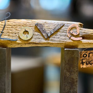 Scrap signs--made to order, cursing optional