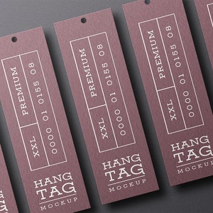 May include: Four brown hang tags with white text. The text reads "HANG TAG MOCKUP", "PREMIUM", "XXL", "0000 01 0155 08".