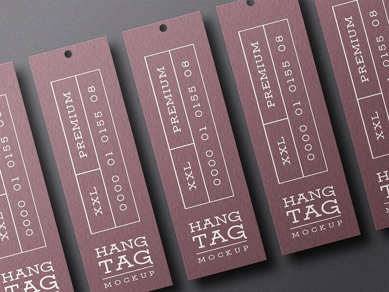 May include: Four brown hang tags with white text. The text reads "HANG TAG MOCKUP", "PREMIUM", "XXL", "0000 01 0155 08".