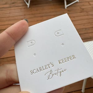 100 Stück schwarze 1.2*4.7'' schwarze Klappetiketten + Goldfolie (Muster anbei)