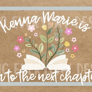 May include: A decorative design on a brown background with the text "Kenna Marie is on to the next chapter." The design includes an open book with flowers and leaves, pink bows, and a light blue border.