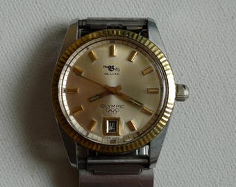 Raro reloj de pulsera automático Incabloc de fabricación suiza de los Juegos Olímpicos de Verano de 1976 (Hudsons Bay, The Bay)