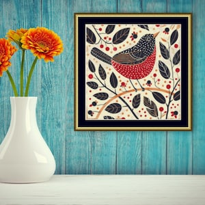 May include: A framed illustration of a red and black bird perched on a branch with black leaves and red berries. The background is a cream color with a black frame.
