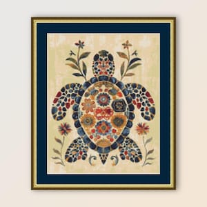May include: A colorful mosaic turtle with flowers and leaves on a cream background. The turtle is framed in a gold and blue frame.