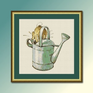 May include: A cross-stitch pattern of a watering can with a small animal inside. The watering can is green and metal with a brown handle. The animal is brown and has its head sticking out of the top of the can.