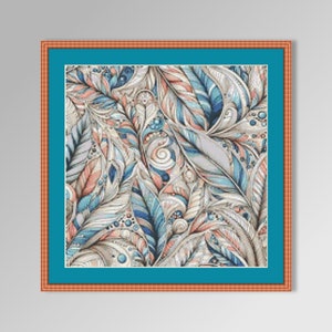 May include: A framed cross-stitch pattern featuring a colourful abstract design of swirling feathers in shades of blue, pink, and white.