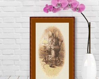 May include: A framed cross-stitch of a mouse sitting in a chair by a table with a lamp. The mouse is sewing with a needle and thread. The cross-stitch is in shades of brown and beige.