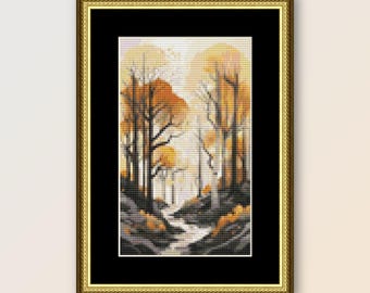 May include: A framed cross-stitch artwork depicting a forest scene with trees in shades of orange, yellow, and brown. The trees are silhouetted against a white background with a stream running through the center.