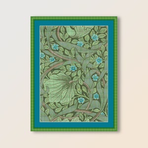 May include: A framed print of a vintage floral design featuring green leaves and blue flowers. The design is reminiscent of Art Nouveau style.