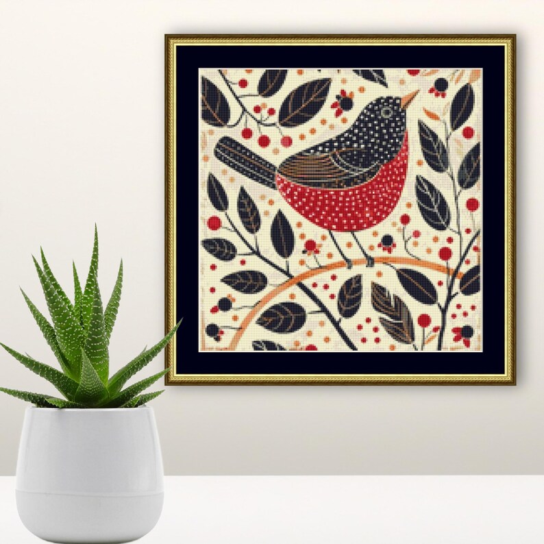 May include: A framed illustration of a red and black bird perched on a branch with black leaves and red berries. The background is a cream color.
