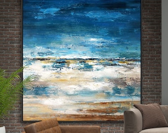 May include: Abstract painting of a seascape with blue, white, and brown colors. The painting is hanging on a brick wall in a living room setting.