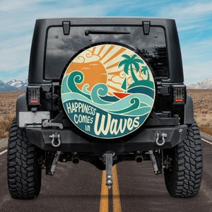 May include: A black Jeep with a spare tire on the back. The spare tire has a colorful design with waves, a sun, and palm trees. The text "Happiness comes in waves" is written on the tire.