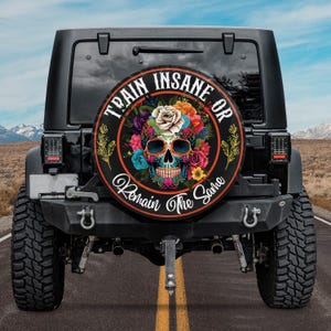 Train Insane Or Remain The Same Spare Tire Cover, Floral Skull Spare Tire Cover, Skull With Flowers Spare Tire Cover, Gift For Her, Women