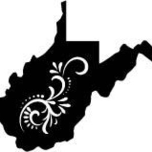 May include: A black silhouette of the state of West Virginia with a white floral design on the left side. The floral design includes swirls and dots. The state outline is detailed with its unique shape.