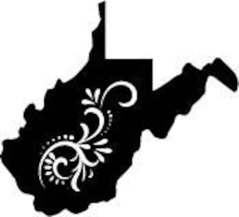 May include: A black silhouette of the state of West Virginia with a white floral design on the left side. The floral design includes swirls and dots. The state outline is detailed with its unique shape.