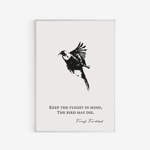 May include: A framed art print featuring a black and white illustration of a bird in flight. The artwork includes the quote, "Keep the flight in mind, The bird may die." The artist's name, Forough Farrokhzad, is also included.