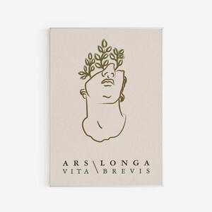 May include: A line drawing of a bust with a crown of green leaves on top. The bust is facing upwards and the text "ARS LONGA VITA BREVIS" is written below the bust.