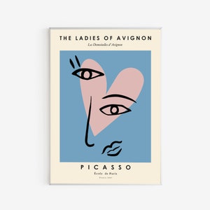 以下が含まれることがあります： 青いハート型の顔と「THE LADIES OF AVIGNON」、「Les Demoiselles d'Avignon」、「PICASSO」、「École de Paris」、「France 1907」のテキストが書かれた青とピンクの抽象的なアートプリント。