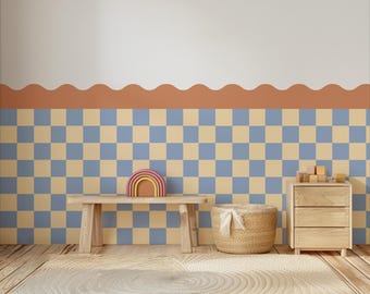 May include: A child's room with a wooden bench, a rainbow-shaped toy, and a woven basket. The wall features a checkerboard pattern in blue and beige, with a scalloped border. A wooden dresser and a round rug complete the scene.