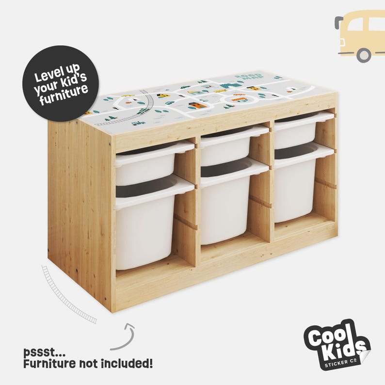 May include: A wooden toy storage unit with four white bins. The top of the unit has a colorful sticker with a road map design and the text "Level up your kid's furniture".