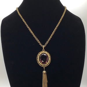 Vintage 1972 Avon Faux Amethyst Gemstone Gold tone Pendant Necklace with Tassels