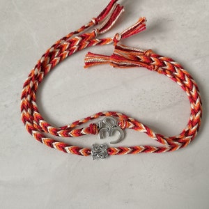 Set of 3 Handmade Red Themed Rakhri Bracelets with OM and Ganesh Charms