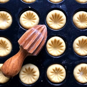Exprimidor de limón de madera hecho a mano