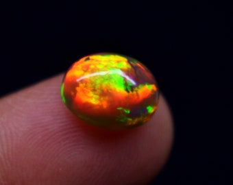 2.90 Carat Galaxy Fire Natural Ethiopian Opal Gemstone Oval Shape Cabochon, Opal Gemstone Size 11X9.1X5.7 MM.