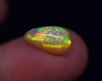 2.10 Carat Rainbow Fire Natural Ethiopian Opal Gemstone Pear Shape Cabochon, Opal Gemstone Size 12.3X6.7X5.7 MM.