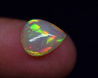 Galaxy Fire Natural Ethiopian Opal Pear Shape 2.20 Carat Ethiopian Opal Cabochon Gemstone Size 11.5X10.2X4.4 mm