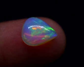 2.20 Carat Rainbow Fire Natural Ethiopian Opal Gemstone Pear Shape Cabochon, Opal Gemstone Size 11.2X9.2X5 MM.