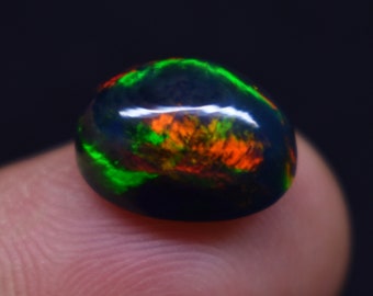 Natural Ethiopian 3 Carat Multi Fire, Size 12.2x8.2x6.3 MM, Black Smoked Opal Oval Shape Cabochon Gemstone,  For Making Jewelry.