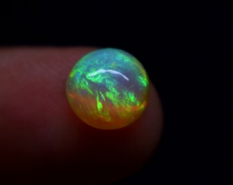 2.10 Carat Galaxy Fire Natural Ethiopian Opal Gemstone Round Shape Cabochon, Opal Gemstone Size 9.1X5.3 MM.