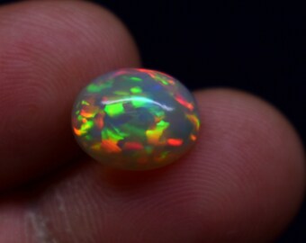 Multi Fire Ethiopian Opal Gemstone, 2.20 Carat Oval Shape Cabochon, Opal Gemstone Size 11.2x9x4.7 MM.