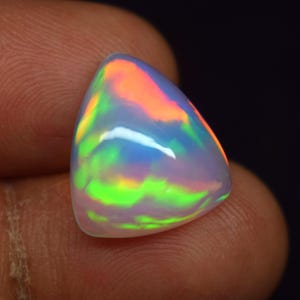 Ethiopian Opal Gemstone: 5.50 Cts Trillion Rainbow Fire Cabochon