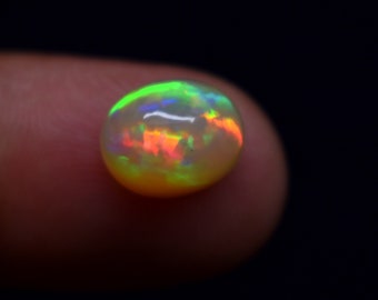 2.50 Carat Green Flashy Fire Natural Ethiopian Opal Oval Shape Cabochon Gemstone, Size 10.2X8.1X6.4 MM, For Making Jewelry.